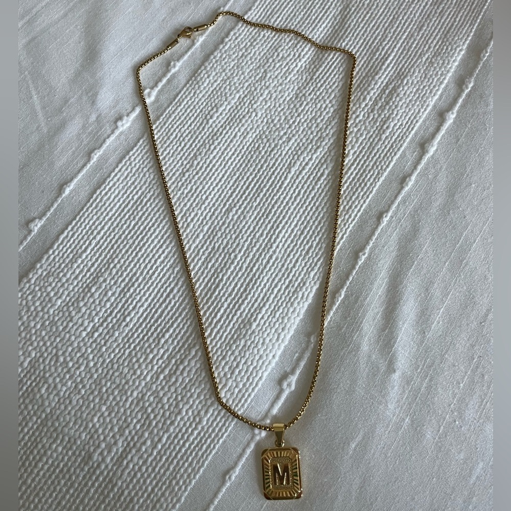 Gold M necklace